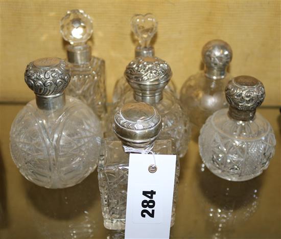 7 silver mounted scent bottles